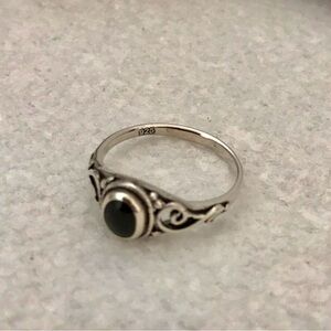 Elegant .925 Sterling Silver Swirl Ring with Black colored resins